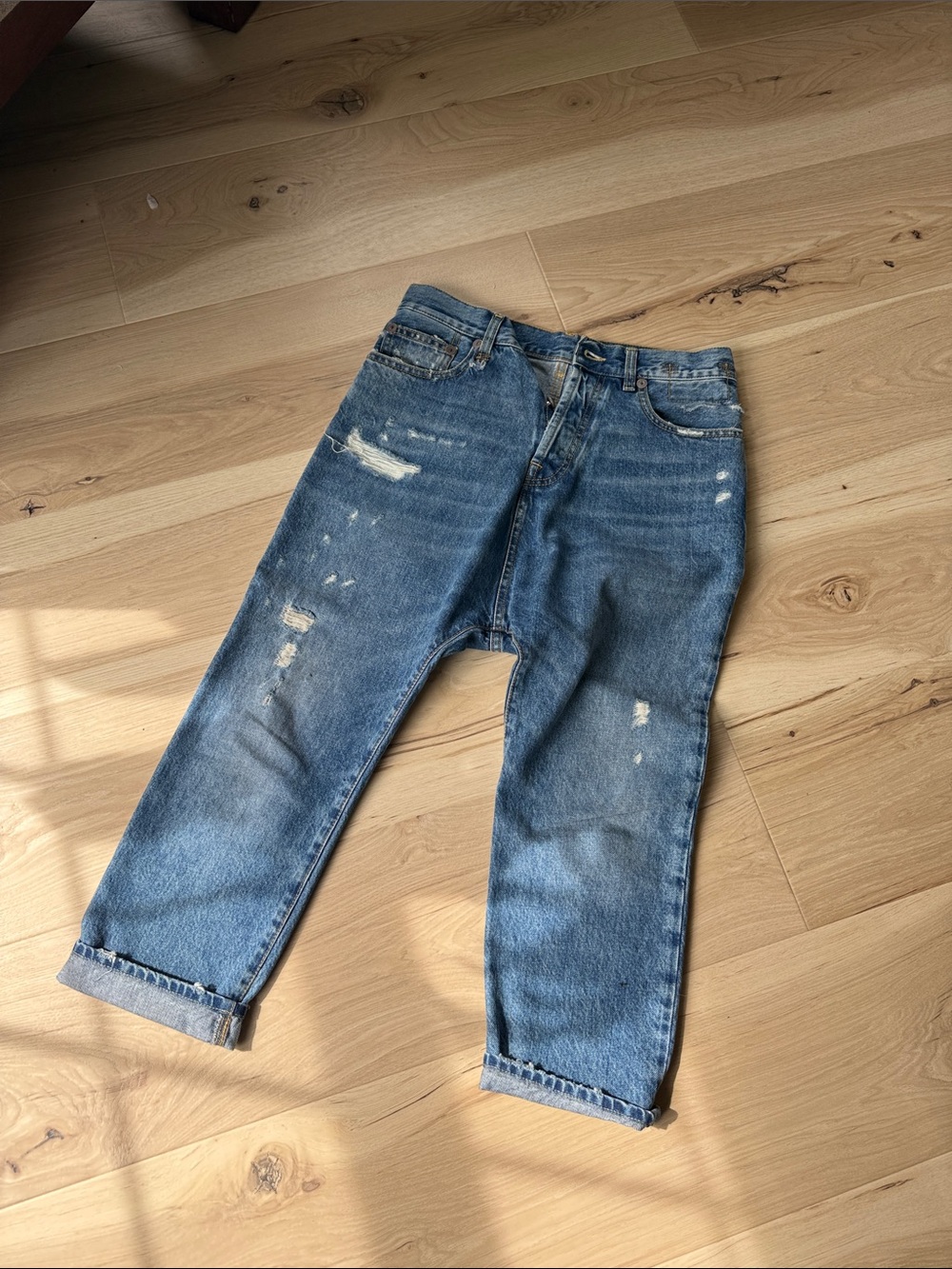 Distressed Blue Jeans